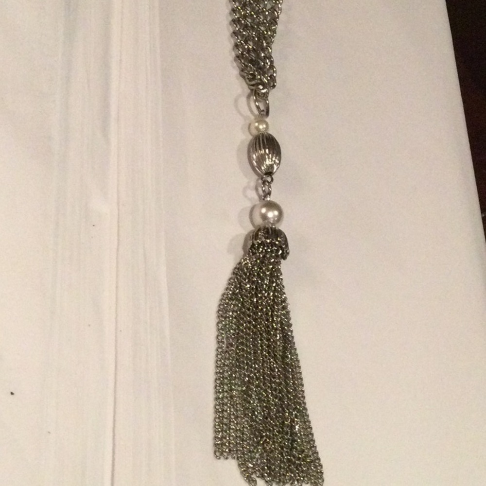 Long silver and pearl necklace with tassel